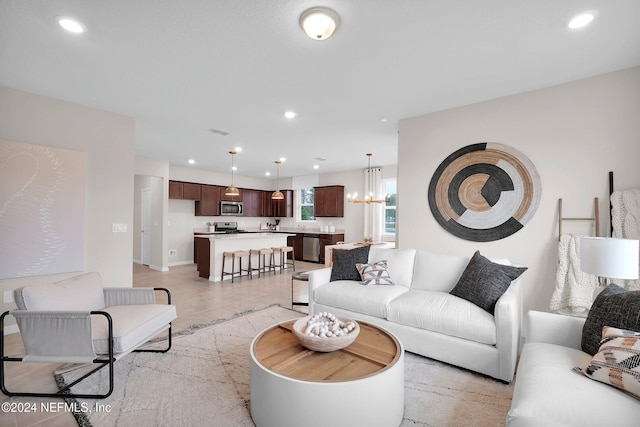 living room with an inviting chandelier