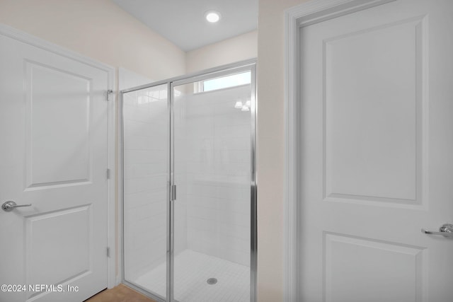 bathroom featuring walk in shower