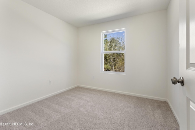 750 Hunter Rd, Palatka, FL 32177 - carpeted empty room featuring baseboards