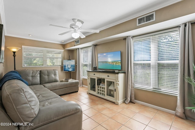 14 Ballard Ave, Saint Augustine, FL 32084 - living area with ornamental molding, light tile patterned flooring, and ceiling fan