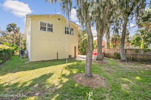 14 Ballard Ave, Saint Augustine, FL 32084 - rear view of house featuring a fenced backyard