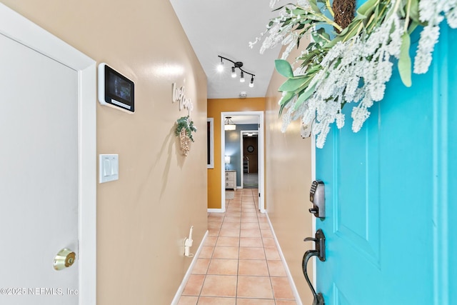 14 Ballard Ave, Saint Augustine, FL 32084 - corridor featuring light tile patterned flooring and baseboards