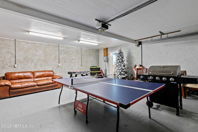 14 Ballard Ave, Saint Augustine, FL 32084 - rec room with a garage, concrete floors, and a textured ceiling