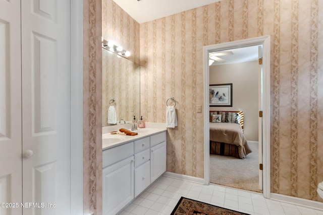 bathroom with tile patterned flooring and vanity