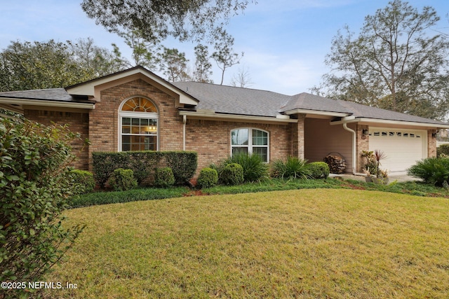 ranch-style house with a garage and a front lawn