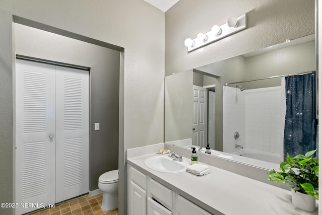 full bathroom with shower / bathtub combination with curtain, vanity, and toilet