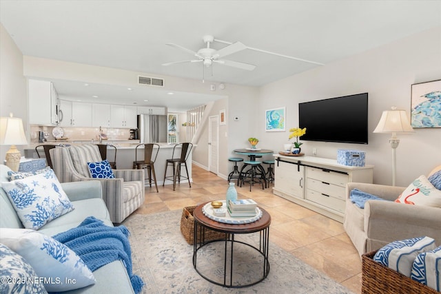 living room with ceiling fan