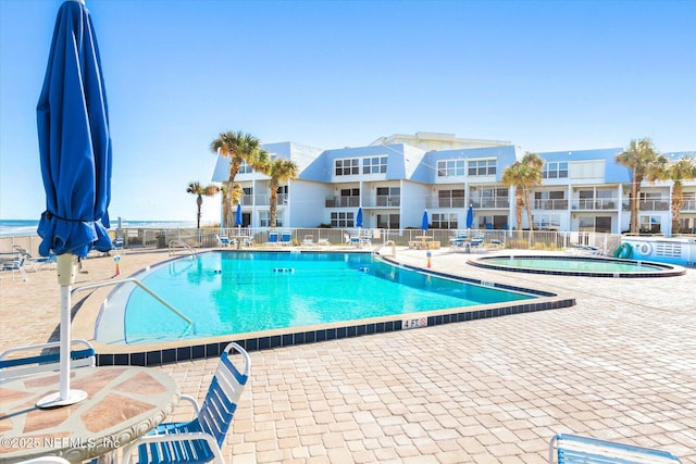 view of pool featuring a patio