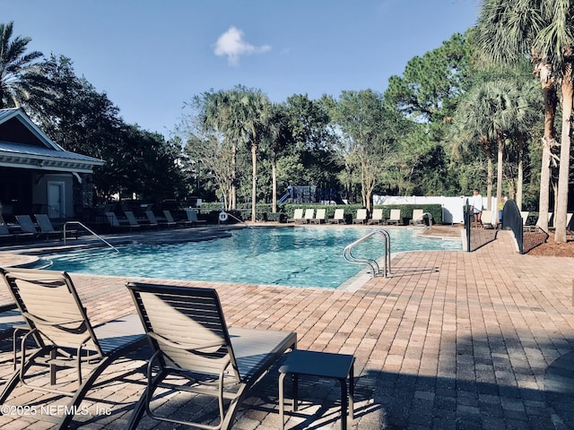 view of pool featuring a patio area