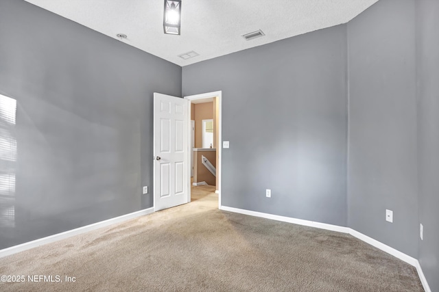 empty room with carpet floors