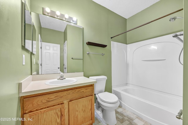 full bathroom with vanity, toilet, and bathtub / shower combination