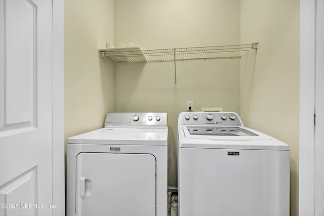 laundry area with washer and dryer