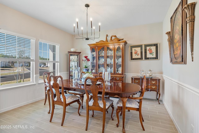 dining space featuring a chandelier