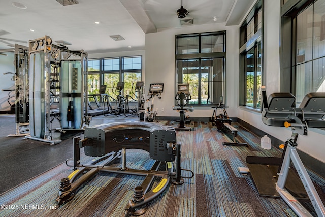 workout area featuring ceiling fan