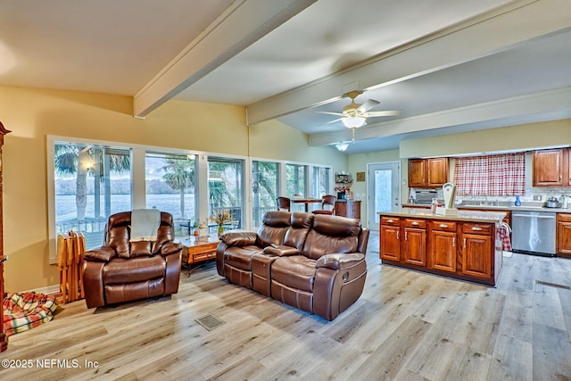 living room with lofted ceiling with beams, light hardwood / wood-style floors, and ceiling fan