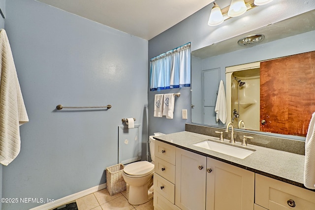 bathroom with a shower, tile patterned floors, vanity, and toilet