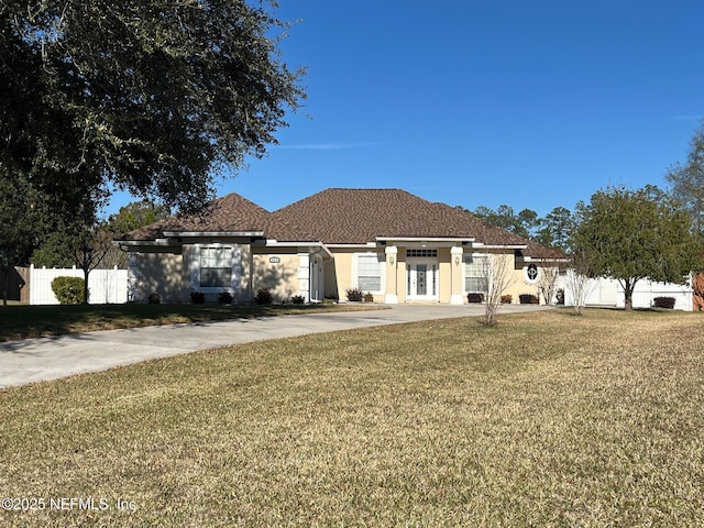 view of front of property with a front lawn