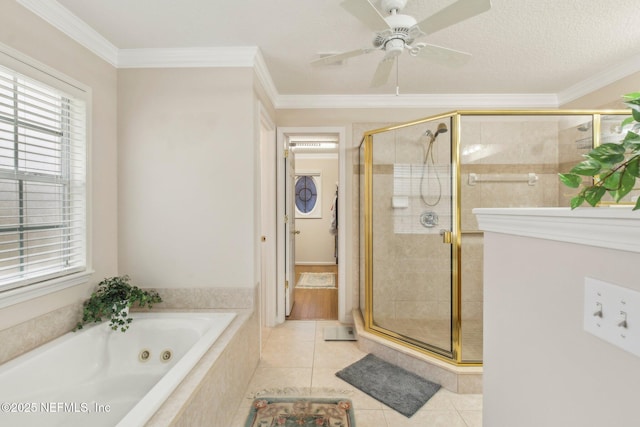 bathroom featuring ornamental molding, tile patterned floors, and shower with separate bathtub