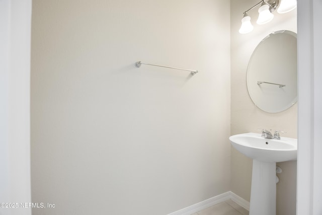 bathroom with tile patterned flooring