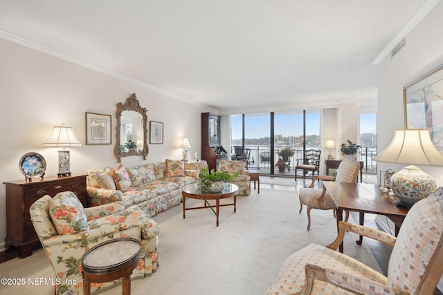 living room with expansive windows, light colored carpet, and ornamental molding