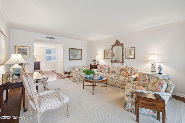 living room with ornamental molding