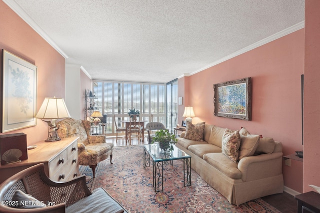 living room with crown molding, a wall of windows, and a textured ceiling