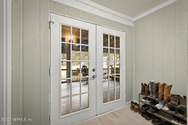 entryway featuring french doors and hardwood / wood-style floors