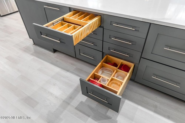 interior details featuring gray cabinets