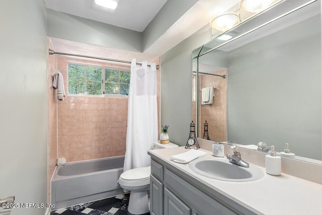 full bathroom with shower / bath combination with curtain, toilet, and vanity