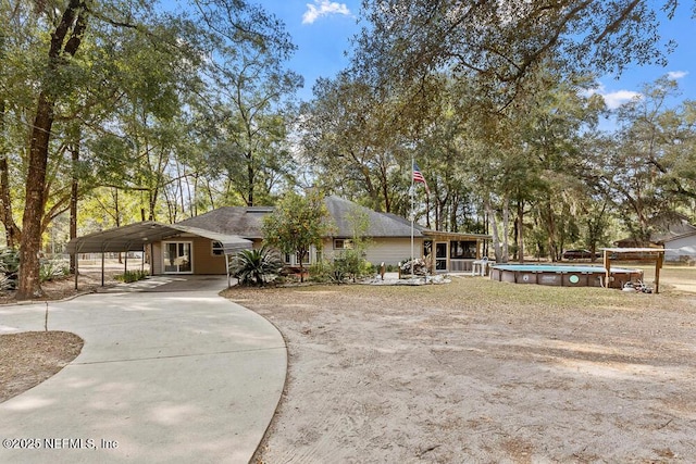 view of front of property with a carport