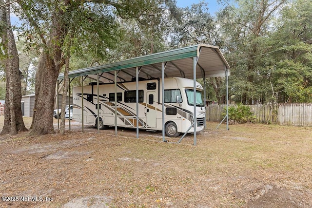 view of outbuilding featuring a carport