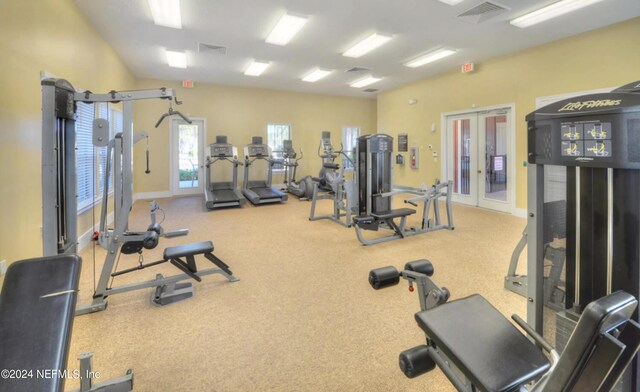 gym with carpet and french doors