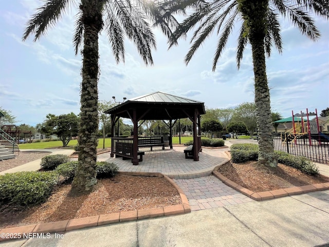 view of home's community featuring playground community and a gazebo