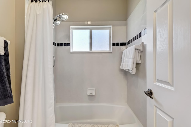 bathroom with shower / bath combo