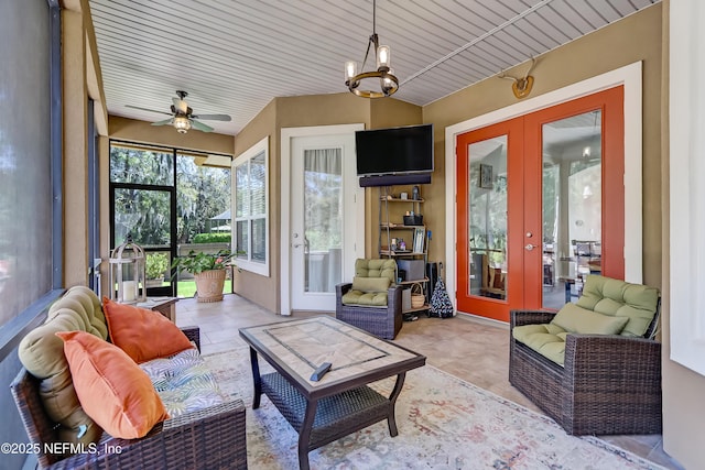 sunroom featuring french doors, wooden ceiling, and vaulted ceiling