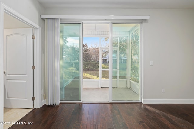 doorway featuring wood-type flooring