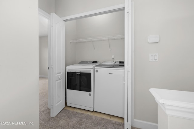 washroom featuring separate washer and dryer