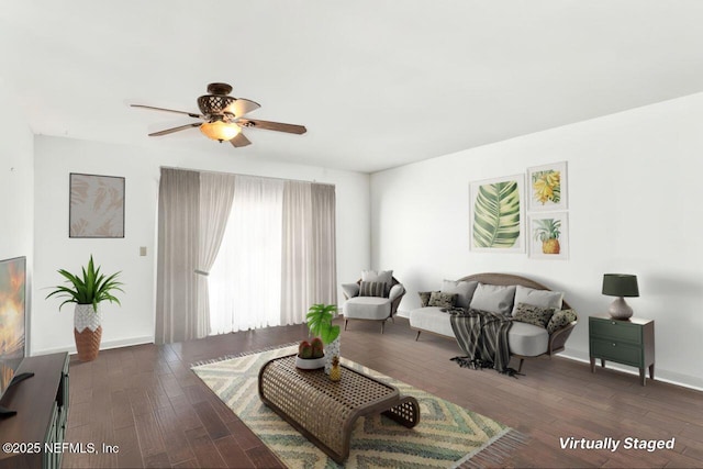 4308 Plaza Gate Ln S Unit 201, Jacksonville, FL 32217 - living room with wood finished floors, a ceiling fan, and baseboards