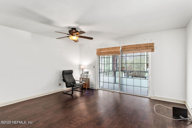 4308 Plaza Gate Ln S Unit 201, Jacksonville, FL 32217 - living area featuring a ceiling fan, wood finished floors, and baseboards