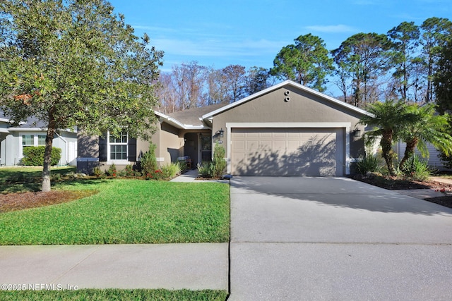 view of front of home featuring a garage and a front lawn