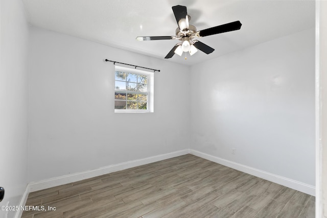 unfurnished room with light hardwood / wood-style flooring and ceiling fan