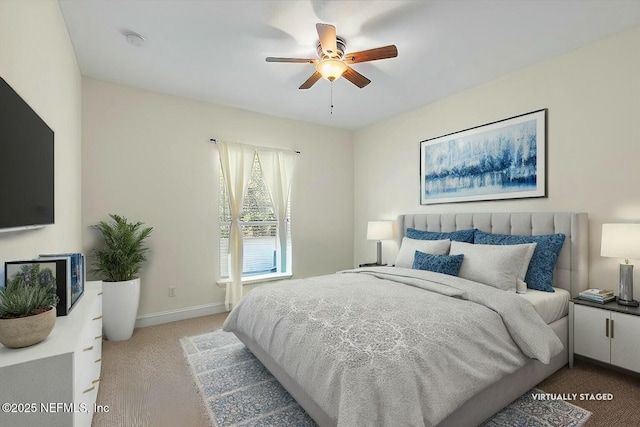 bedroom featuring ceiling fan and light colored carpet