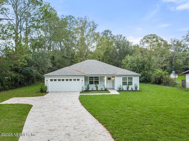 single story home featuring a front yard and a garage