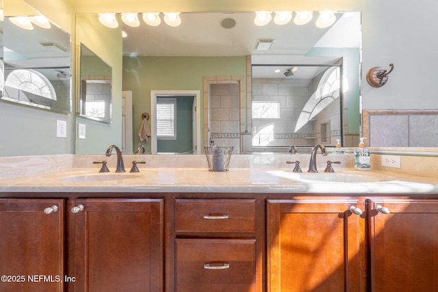 bathroom with vanity and walk in shower