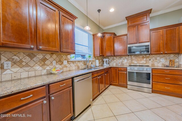 kitchen with backsplash, pendant lighting, crown molding, and stainless steel appliances