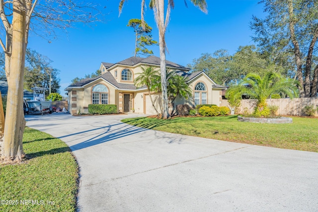 view of front facade with a front yard