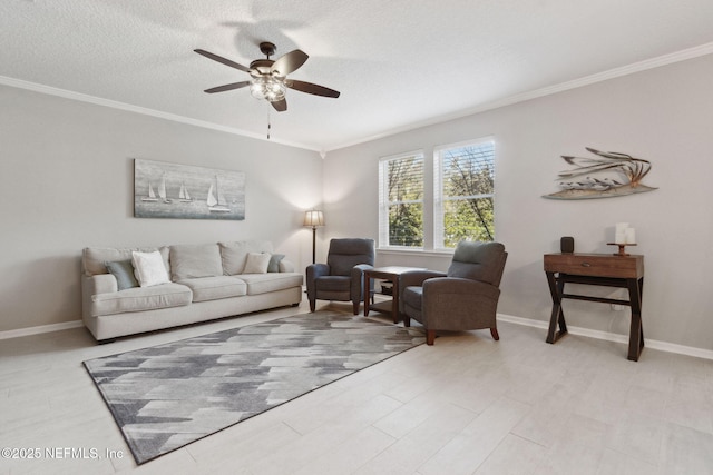 living room with ceiling fan, crown molding, and a textured ceiling