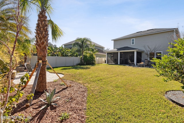 view of yard with a sunroom