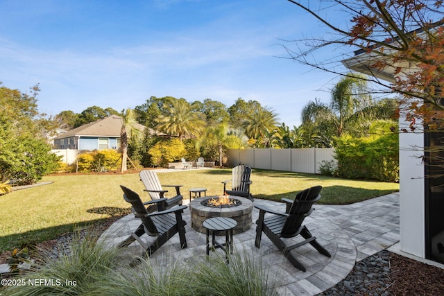 view of patio with a fire pit