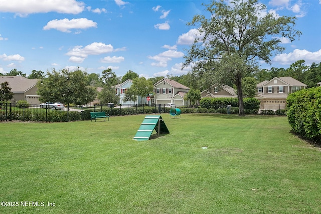 view of community featuring a lawn